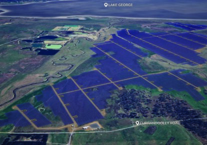 Blind Creek Solar Farm concept image: overhead view of solar panels laid out across agricultural land.